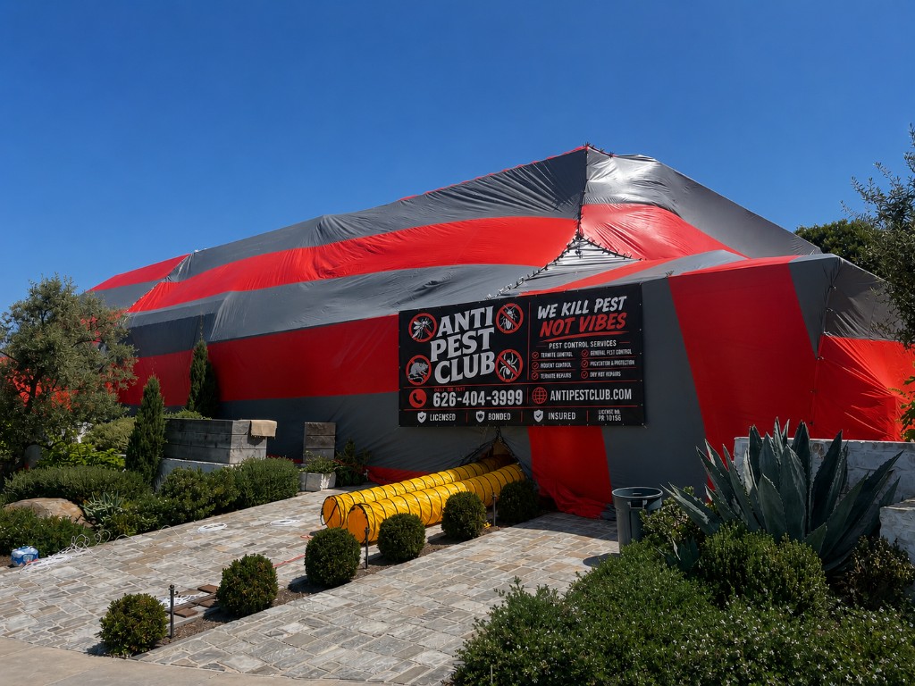 Anti Pest Club fumigation tent on a residential home with company banner